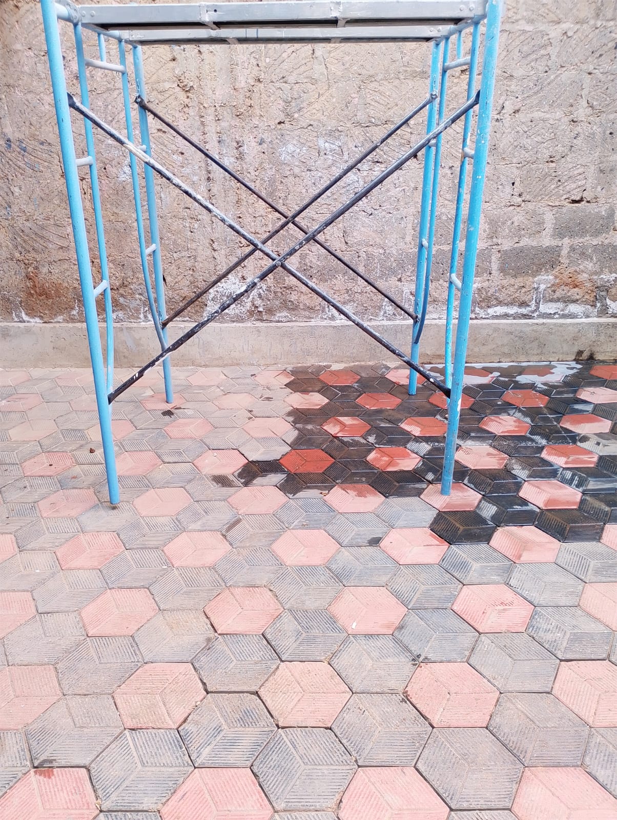 Light blue H-frame scaffolding bay with cross braces